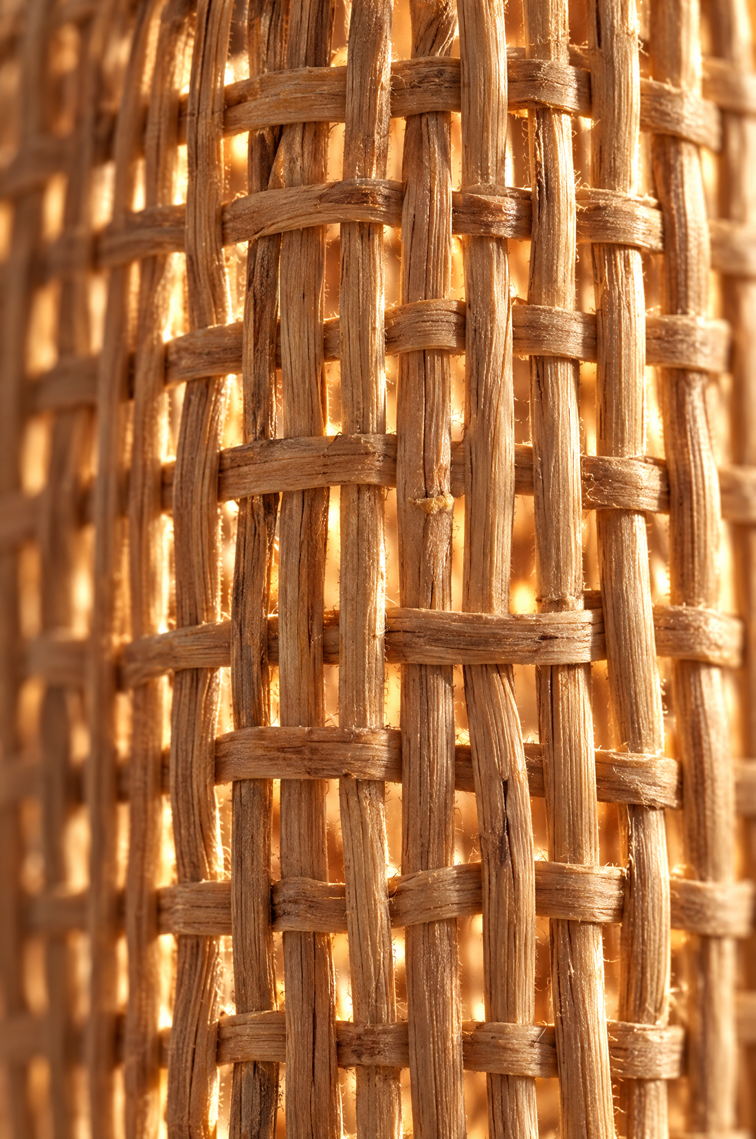 Close-up of the woven rattan weave backlit