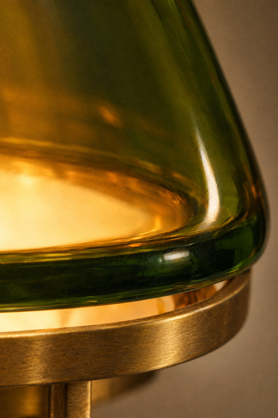 Close-up of the coloured glass rim where it thickens, resting on its brass ring