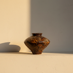 Wide-shouldered vase in a glossy amber tortoiseshell glaze