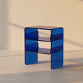 Two-tier translucent blue acrylic side table
