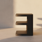 Cantilevered dark side table with a recessed lower shelf