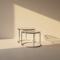 Round glass nesting side tables on slim chrome frames