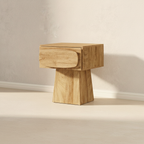 Solid oak nightstand with a rounded drawer on a plinth base