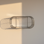 Oval wall shelf drawn in close-set silver wire