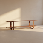 Long low walnut media console with a full-width open shelf