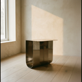Folded steel side table with a mirrored surface