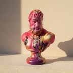 Classical Hercules bust finished in pink with graffiti marks