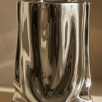 Macro detail of the crumpled electroplated chrome creases