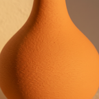 Macro detail of the flat matte orange glaze