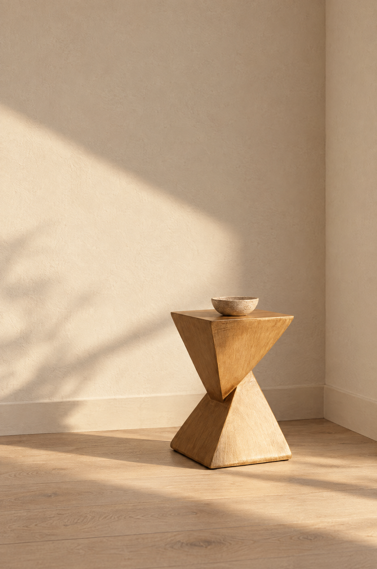 Faceted hourglass wood stool table in a quiet room corner